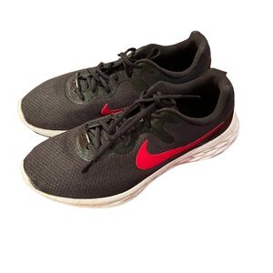 NIKE REVOLUTION brand tennis shoes. Size 10. Gently worn.